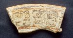 MSJ2A-5-9-2/motul:185 || Tripod plate with ridge. Glyphs.