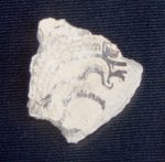 Potsherd: plate; chinos; black on cream. Maya Motul de San Jose collection of whole and partial polychrome vessels of Late Classic period.