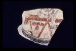 MSJ2A-5-6-17/motul:272 || Tripod plate; human seated on throne.